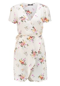 Květinové šaty s volným střihem v světle béžové barvě, s krátkými rukávy, výstřihem do V a páskem v pase. Design obsahuje růžové a žluté kv�ěty.