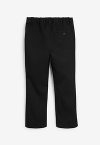 Pantalons noirs en tissu tissé avec une taille élastique, des jambes droites et une seule poche arrière dotée d'un bouton de fermeture.