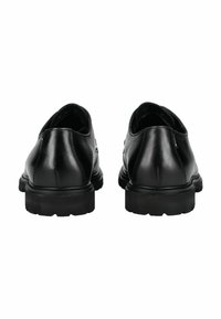 Scarpe in pelle nera con una finitura liscia, punta arrotondata e suola in gomma testurizzata. La vista posteriore mostra un leggero tacco e un design senza cuciture.