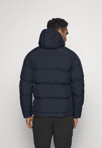 Peak Performance RIVEL JACKET - Dunjakke - blue shadow
