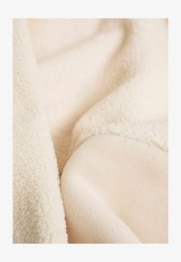 Ausgewählt, beige
