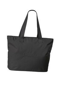 Sac fourre-tout noir en tissu durable, doté de deux poignées robustes et d'un logo en relief sur le devant. Design rectangulaire simple.