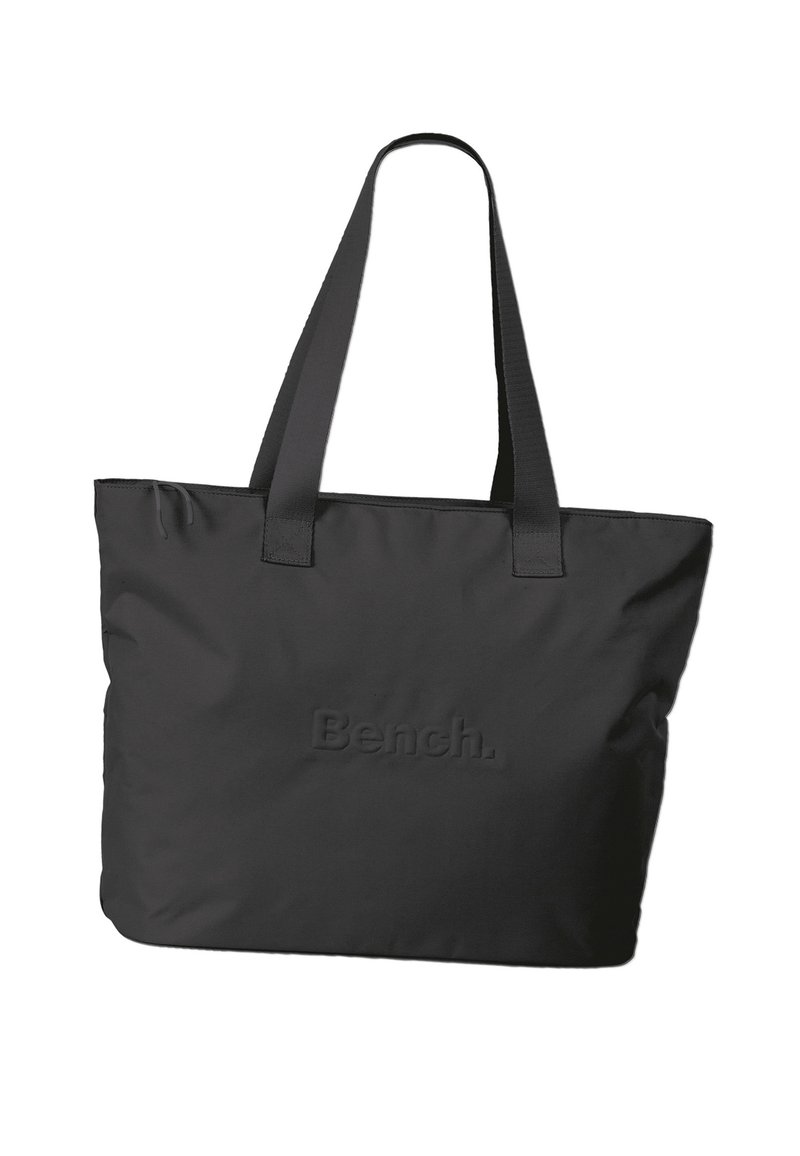 Sac fourre-tout noir en tissu durable, doté de deux poignées robustes et d'un logo en relief sur le devant. Design rectangulaire simple.