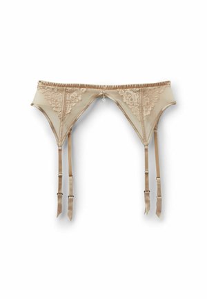 Liguero de encaje beige con cuatro tirantes ajustables y un pequeño adorno central decorativo sobre un fondo blanco.