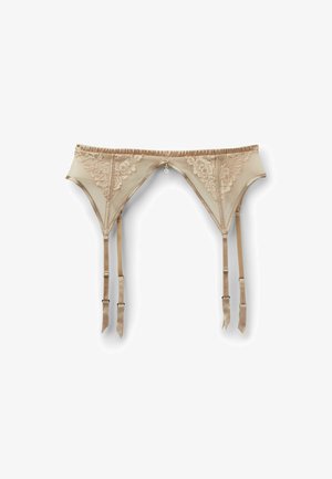 Liguero de encaje beige con cuatro tirantes ajustables y un pequeño adorno central decorativo sobre un fondo blanco.