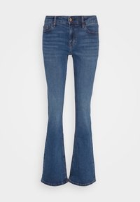 Jean flare en denim bleu avec fermeture à bouton et zip, poches avant et arrière, et légère décoloration aux cuisses et aux genoux.