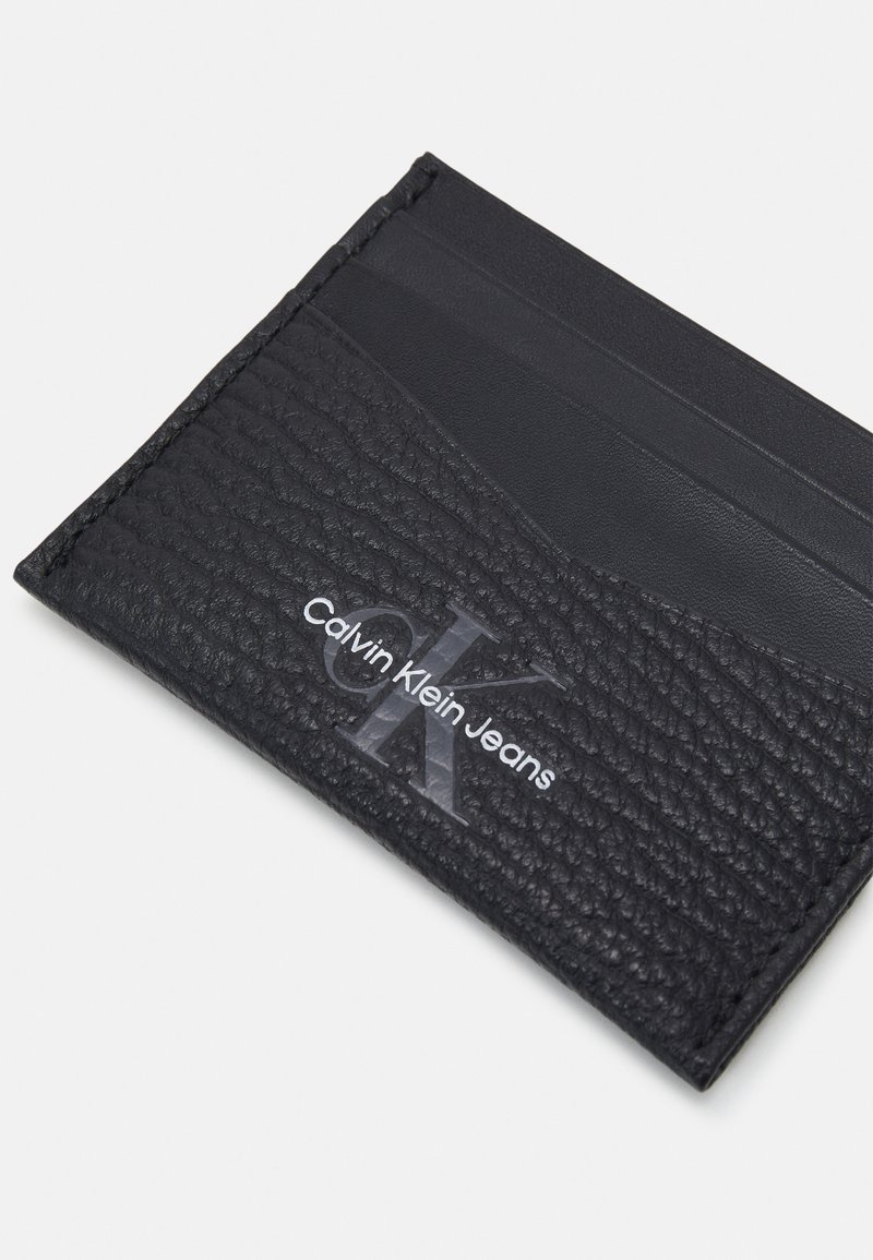 Herren Geldbörsen | Calvin Klein Jeans MONO TEXTURED CARDCASE UNISEX Geldbörse black/schwarz - OV09023 Herren Geldbörsen | Calvin Klein Jeans MONO TEXTURED CARDCASE UNISEX Geldbörse black/schwarz - OV09023