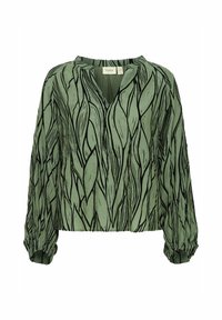 Blouse verte avec un motif noir feuillu, dotée d'un décolleté en V et de manches longues froncées, en tissu léger.