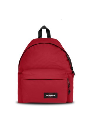 Red backpack made of durable fabric, featuring a rounded shape, front zip pocket, and adjustable black straps. Eastpak logo on the front.
