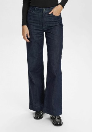 Dark denim flared jeans with a high waist, featuring a front button closure and two side pockets. Smooth texture and wide leg design.
