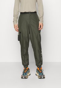 EA7 Emporio Armani Teplákové kalhoty - olive