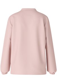 Rosa Langarmshirt aus weichem Stoff, mit rundem Kragen und elastischen Bündchen, in einem glatten, einfarbigen Design.