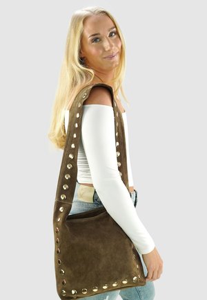 Brown suede shoulder bag with metal accents along the strap, featuring a rectangular shape and soft texture.