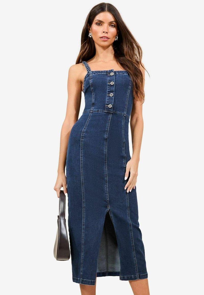 Jeans midi obleka s prilegajočim bodicem, vrvico z ramenom, sprednjim gumbom in srednjim razporkom. Temno modra barva s podrobnostmi šivov.
