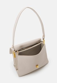 Coccinelle BINXIE - Handbag - white