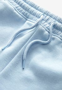 Next SLIM FIT CUFFED JOGGERS - Tepláky - ice blue