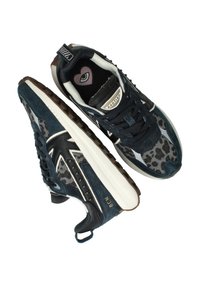 Navy blue and gray leopard print sneakers with white midsoles, black laces, pull tabs, and a heart with an eye graphic on the insoles.