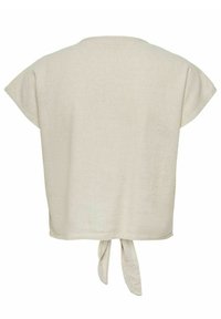 Top in lino beige con una vestibilità ampia, maniche corte e dettaglio di nodo legato sul retro. Texture liscia e design semplice.