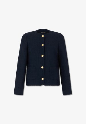 Navyblauw gestructureerd damesjack met lange mouwen, ronde hals, twee steekzakken aan de voorkant en vijf gouden knopen middenvoor.