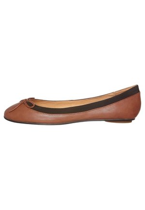 Brown leather ballet flat with a rounded toe, black elastic band at the vamp, and a decorative bow on the toe. Smooth texture, minimal design.