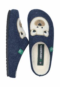 Navy blue felt slippers featuring a bear face design, soft cream lining, and a black rubber sole. Includes a green brand tag on the side.