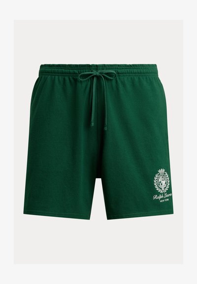 Grønne bomullsshorts med elastisk midjebånd, snøring og hvit brodert logo med et skjolddesign nederst til venstre.