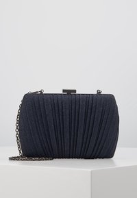 Navy clutch bag with pleated design, metallic shimmer, and a chain strap. Features a rectangular shape and a clasp closure.