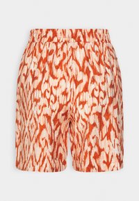 Shorts à taille élastique avec un motif abstrait animalier orange et crème, à coupe ample et décontractée.