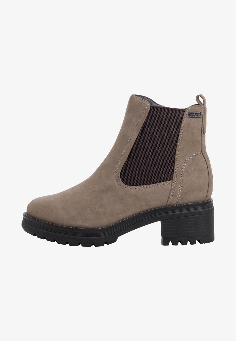 Bottine Chelsea en daim taupe avec panneau latéral élastique noir, languette de tirage et talon noir épais avec semelle crantée.