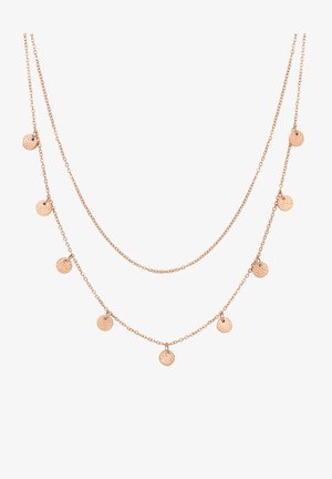 Collana a strati in oro rosa con piccoli pendenti circolari texturizzati. Caratterizzata da catene sottili di diverse lunghezze, crea un design delicato.