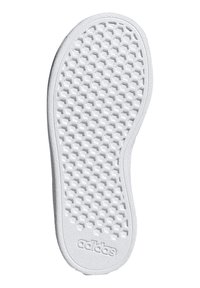 White sneaker sole featuring a hexagonal pattern, textured surface, and branded detail. Curved edges with smooth finish.
