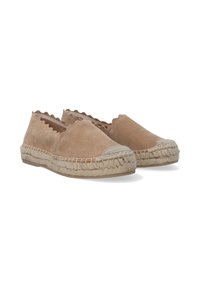 Béžové semišové espadrilky s vlnitými okraji a tkanými juty detaily na špičce. Flexibilní podrážka a měkká vnitřní podšívka pro pohodlí.