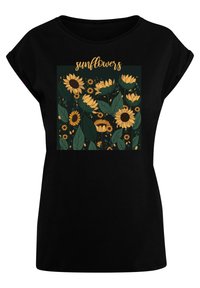 Black short-sleeved T-shirt featuring a floral design with yellow sunflowers, green leaves, and the word "sunflowers" in a decorative font.