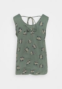 Vihreä, ilman hihoja oleva paita, jossa on beigen ja laivastonsinisen kukkakuosi. Takana on solmimislukitus ja pyöreä kaula-aukko. Pehmeä kangas.