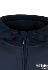 Navyblaues Sportjackett mit fleecegefütterter Kapuze, Reißverschluss und gesticktem Logo. Weicher Stoff mit verstellbaren Kordelstoppern.
