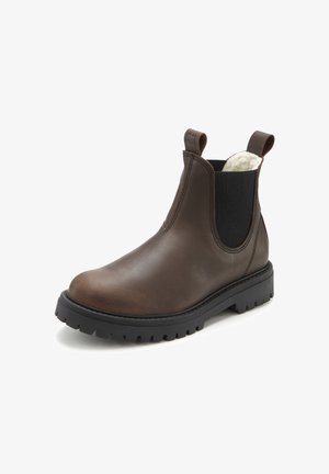 Brown leather ankle boot with elastic side panels, textured interior, and a sturdy black rubber sole featuring a lug pattern for traction.