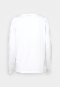 T-shirt bianco a maniche lunghe realizzato in cotone, con colletto a girocollo e vestibilità rilassata, senza motivi o decorazioni visibili.