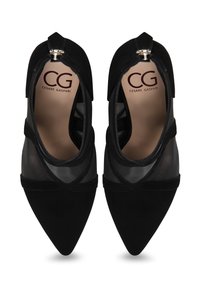 Scarpe nere con tacco alto e design a punta. Realizzate in tessuto liscio con pannelli in rete semitrasparente, presentano una chiusura con zip sul retro.