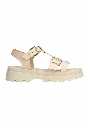 Beige platform sandals with two adjustable straps and gold hardware. Textured sole with geometric cutouts for grip and support.