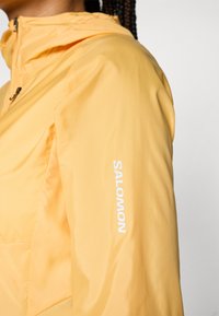 Salomon BONATTI CROSS  - Veste de running - warm apricot