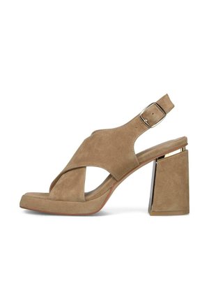 Beige Wildleder-Sandale für Damen mit offenem Zehenbereich, überkreuzten Riemen, verstellbarer Schnalle und Blockabsatz mit metallicfarbener Details.