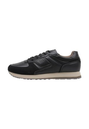 Zapatillas deportivas negras con cuero liso y ante texturizado, con un diseño de cordones y una suela beige. Detalle del logo visible en el lateral.