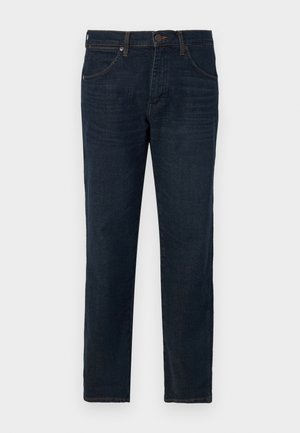 Dunkelblaue Jeans aus Denim mit geradem Schnitt, fünf Taschen und kontrastierenden Nähten. Mit Knopfverschluss und Gürtelschlaufen.