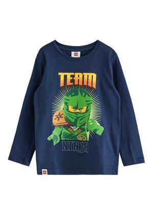 T-shirt a maniche lunghe blu navy in cotone, con una grafica di un ninja verde e il testo "TEAM NINJA" in lettere grasse e colorate.