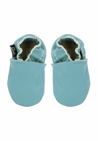 Blaue Lederschuhe für Babys mit einem weichen, elastischen Schaftabschluss, runder Zehenform und kontrastierender weißer Naht entlang der Kanten.