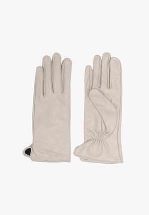 Skórzane rękawiczki w miękkim beżu z długimi palcami, marszczonym detalem wokół nadgarstka oraz otworem u podstawy dla łatwego zakładania. Gładka struktura, bez widocznych wzorów.
