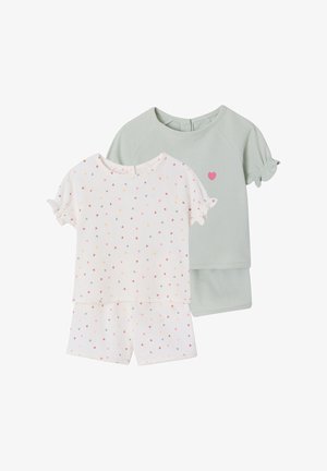 Two toddler sets: one white with multicolored tiny hearts, short sleeves, and shorts; the other light green with pink heart detail and shorts.