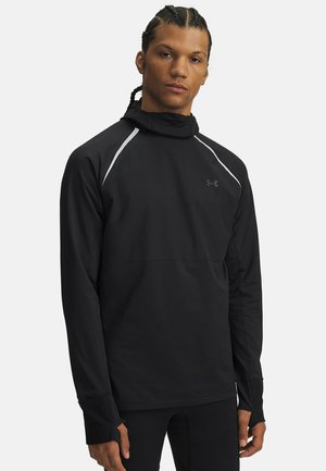 Black athletic pullover with a high neck, long sleeves, and thumbholes. Features reflective white accents and a smooth, lightweight fabric.