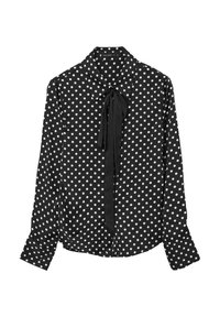 Schwarze Bluse mit Polka-Punkten, langen Ärmeln, Kragen und einem Bindeband am Ausschnitt, hergestellt aus einem glatten, leichten Stoff.