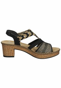 Zwarte en tan sandaal met een geweven bovenkant, kurken wiggenhiel en elastische banden. Het heeft een open teenontwerp en een textuur van kurkdetails.